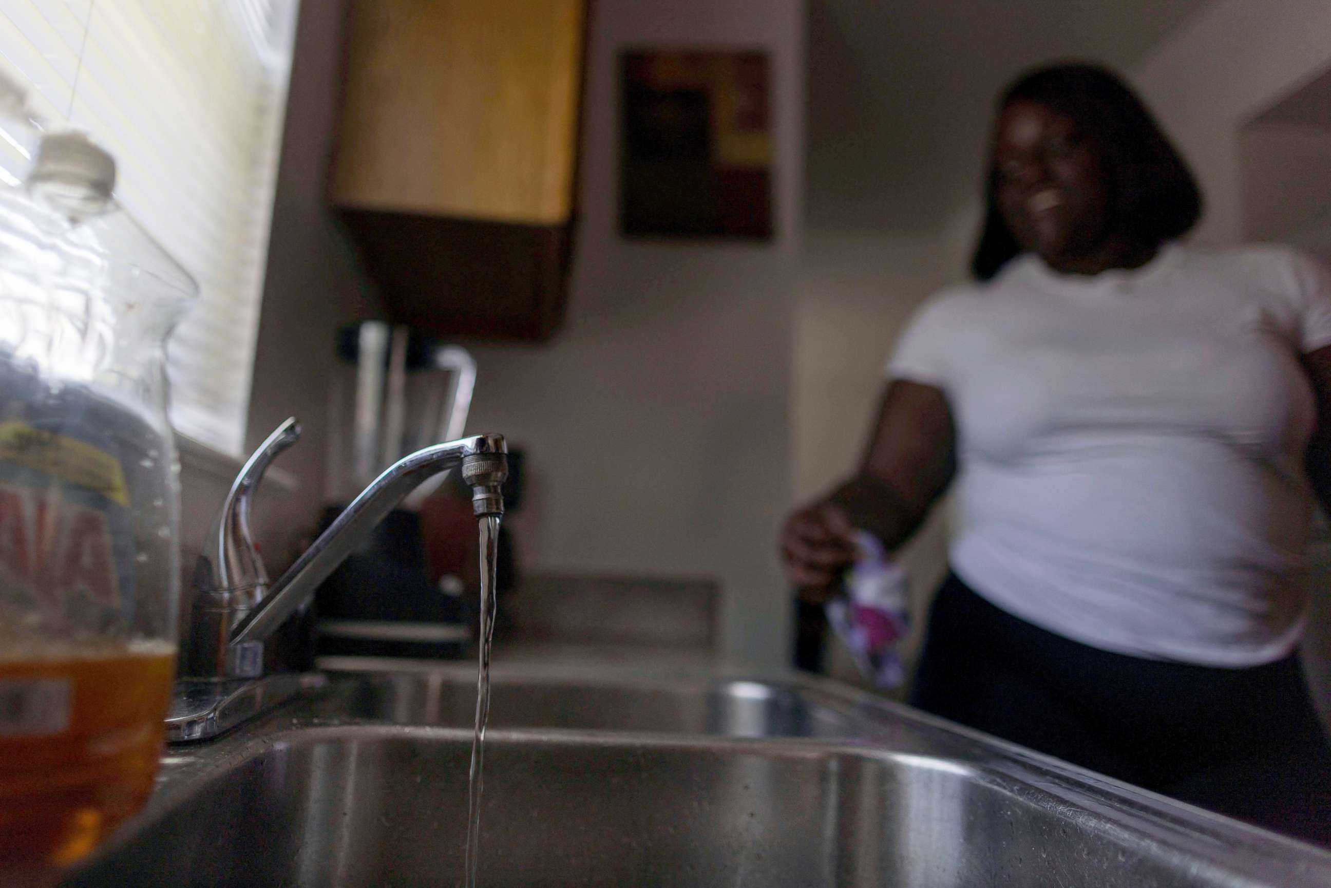 PHOTO: Water is seen running from a faucet in Jackson, Mississippi, Sept. 1, 2022.