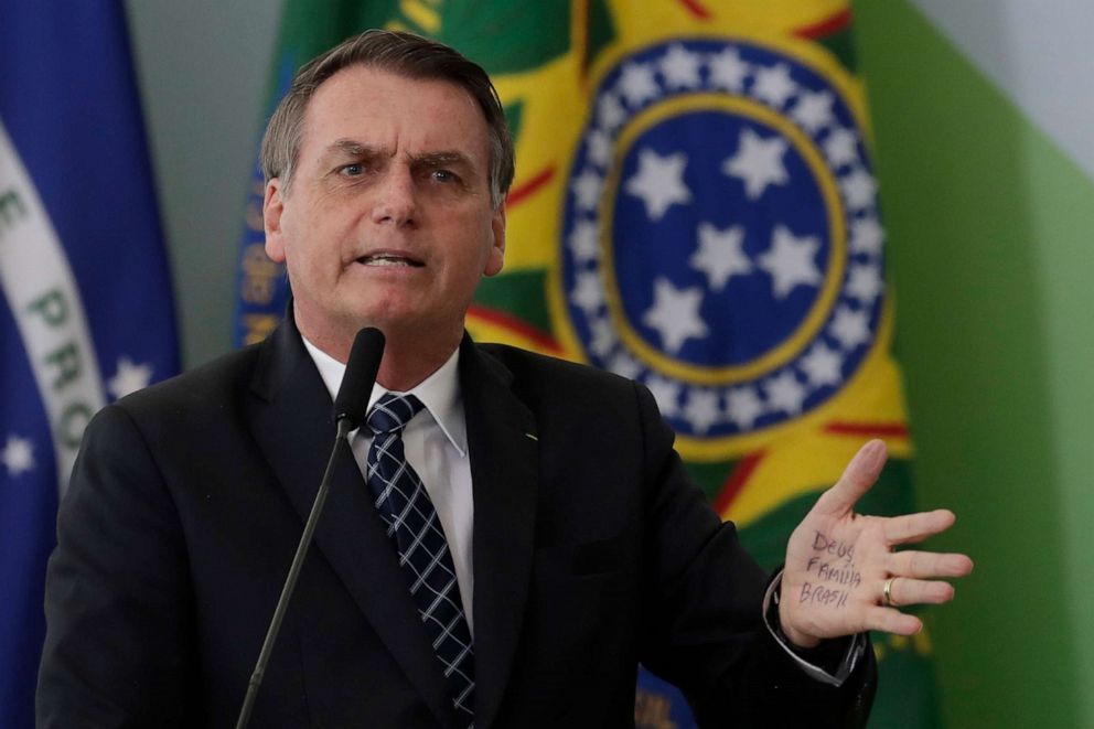 PHOTO: Brazil's President Jair Bolsonaro's hand shows notes for his speech that read in Portuguese "God, Family, Brazil," during a speech at the Planalto Presidential Palace, in Brasilia, Brazil, Aug. 1, 2019.