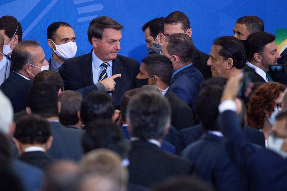 PHOTO: President of Brazil, Jair Bolsonaro, talks after ceremony for the country's newly appointed Minister of Communications at the Planalto Palace on June 17, 2020, in Brasilia.