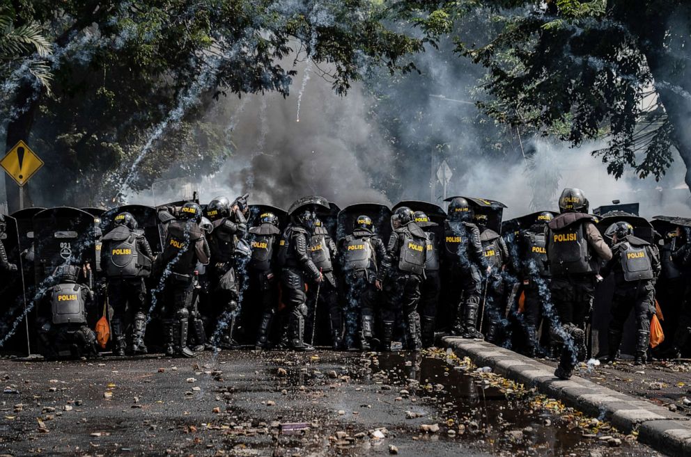 PHOTO: Indonesian riot police clash with protesters during a demonstration after the official government election results were announced, May 22, 2019, in Jakarta, Indonesia.