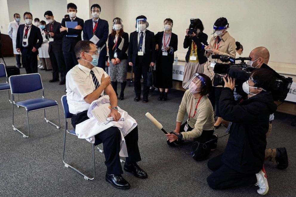 PHOTO: Director of the Tokyo Medical Center Kazuhiro Araki speaks to the media after receiving a dose of the coronavirus vaccine as Japan launches its inoculation campaign, in Tokyo, Feb. 17, 2021.