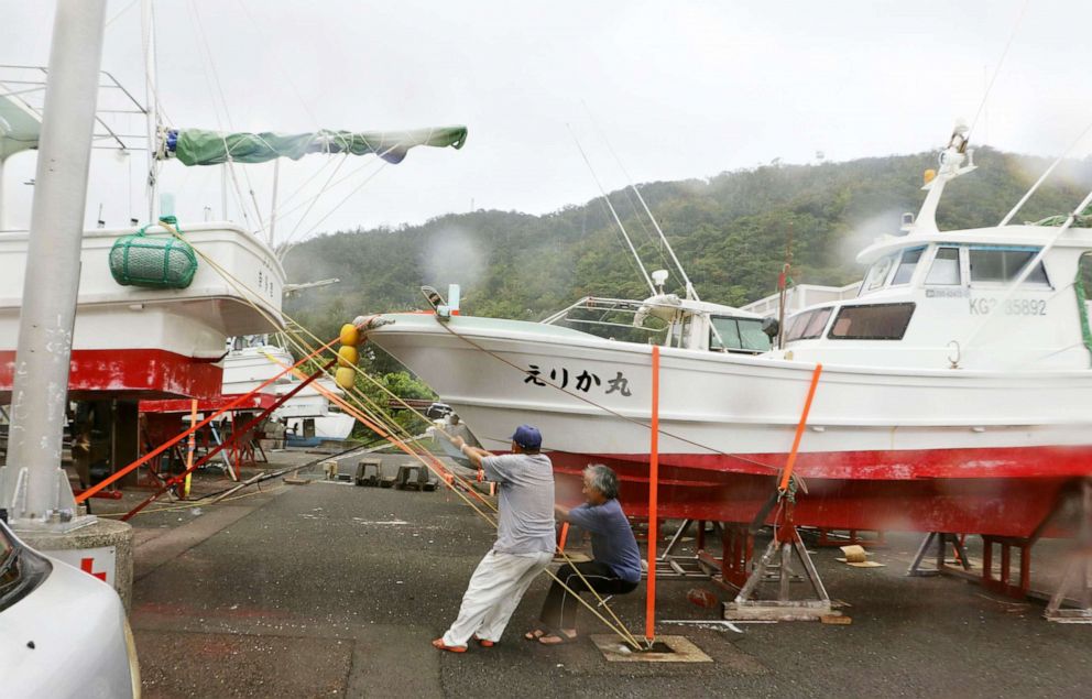 PHOTO: Vessels are taken out of the water in preparation against the approaching Typhoon Haishen at a port in Amami, southwestern Japan, Sept. 4, 2020. 