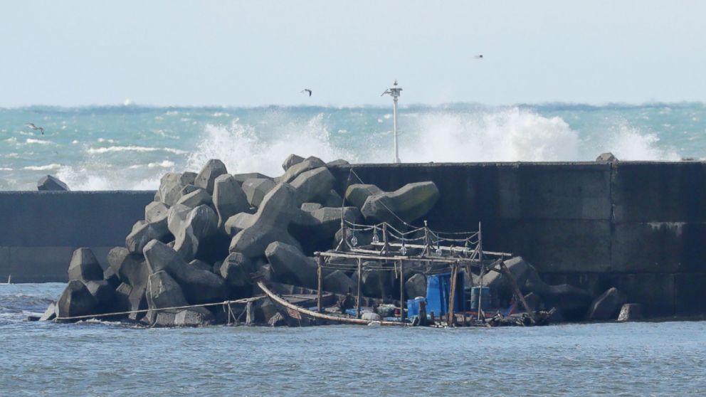 PHOTO: The wreckage of a boat is pictured along a sea wall in the city of Yurihonjo, Akita prefecture, Japan, Nov. 24, 2017.
