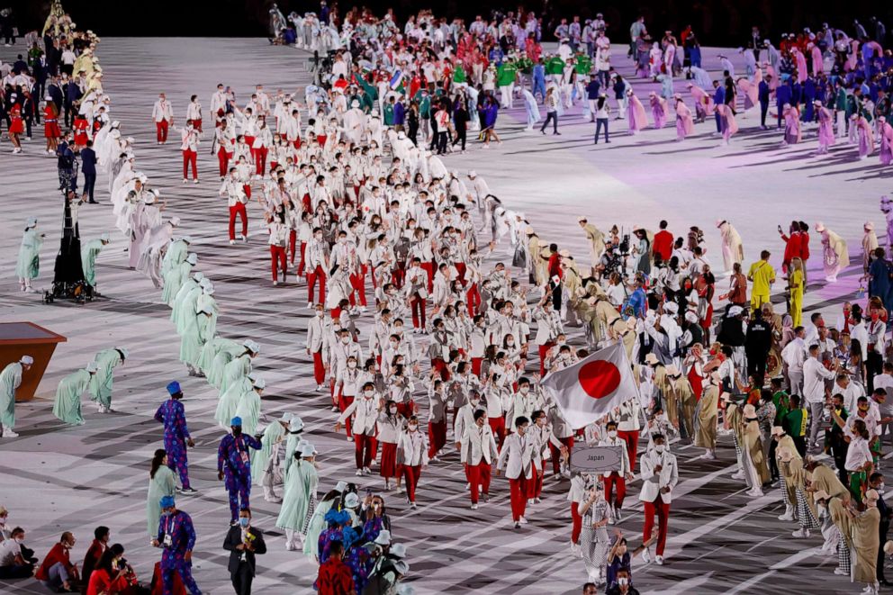 PHOTO: Flagbearers Yui Susaki of Japan and Rui Hachimura of Japan lead their contingent in the athletes parade during the opening ceremony of the Olympic Games in Tokyo, July 23, 2021.