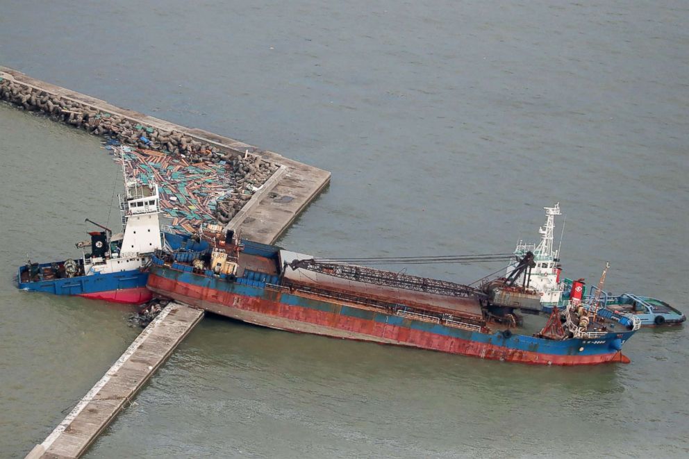 PHOTO: A ship sits in the water after colliding with a breakwater during high winds from typhoon Jebi in Nishinomiya city, Hyogo prefecture on Sept. 5, 2018.