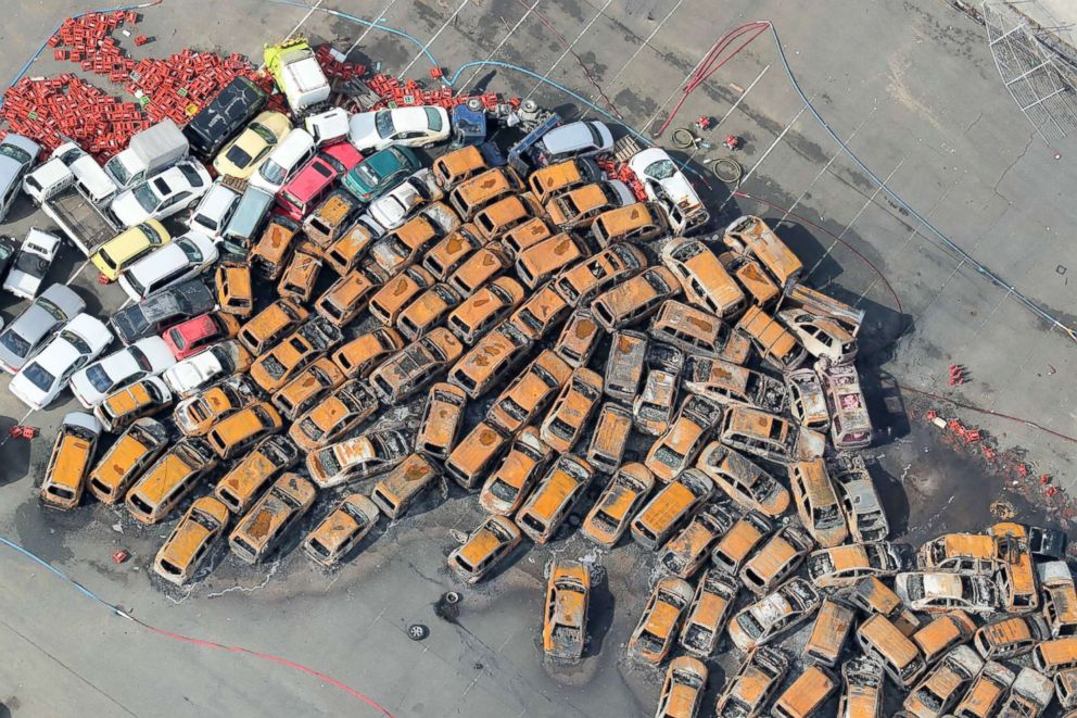 PHOTO: Burnt passenger vehicles sit in a parking lot after a storm surge and strong winds caused by typhoon Jebi in Nishinomiya, Hyogo prefecture on Sept. 5, 2018.