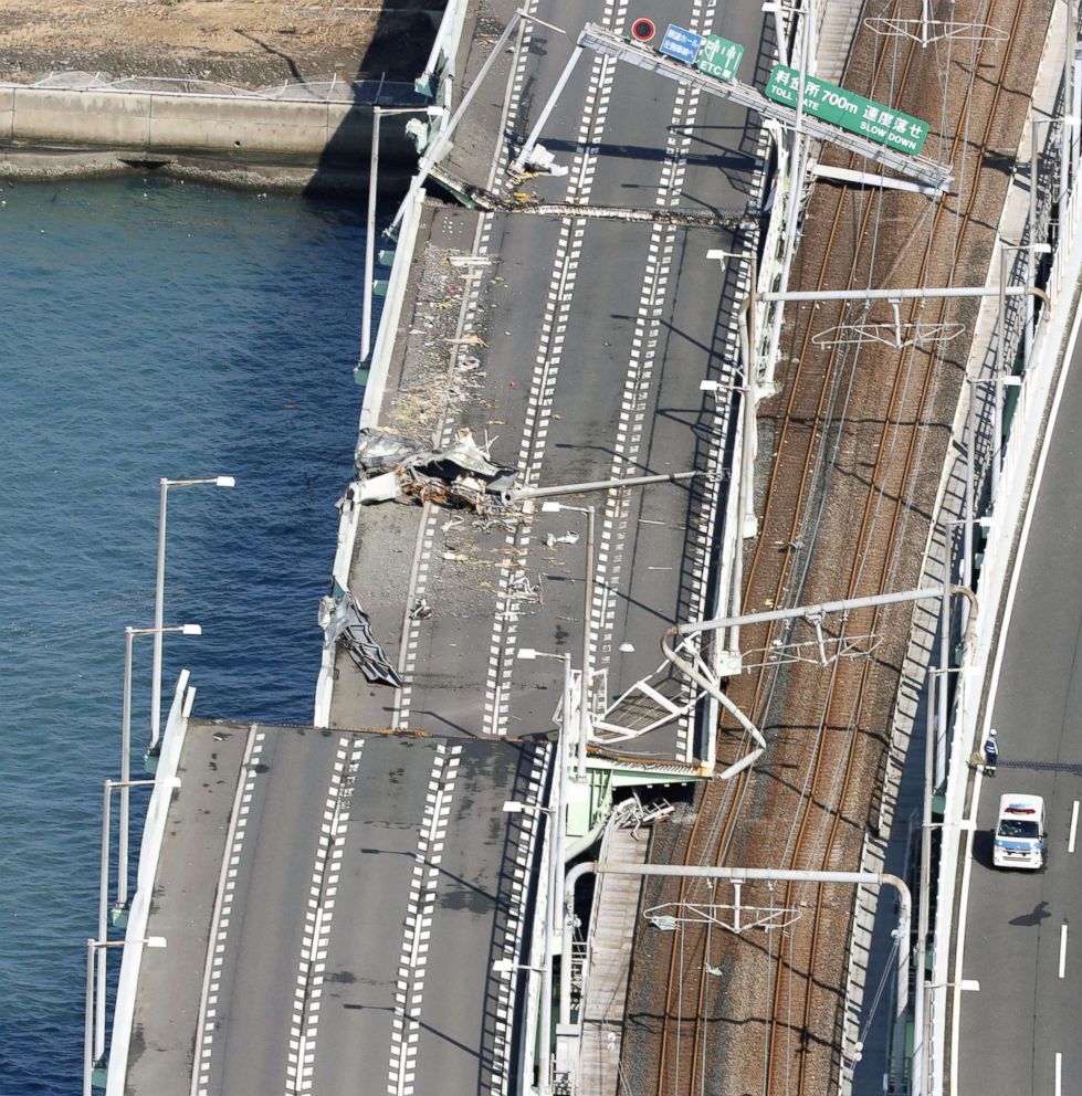 PHOTO: A bridge connecting Kansai airport to the mainland was damaged when it was hit by a 2,591-ton tanker pushed by winds from typhoon Jebi in Izumisano, western Japan, Sept. 5, 2018.