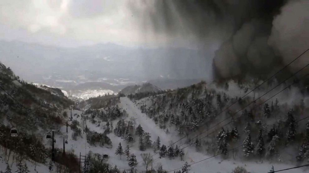 PHOTO: Thick black smoke moves down the snow-covered side of the volcano towards a ski slope after an eruption, in an image from the Kusatsu Mt. Shirane Gondola Unjo camera, Jan. 23, 2018.