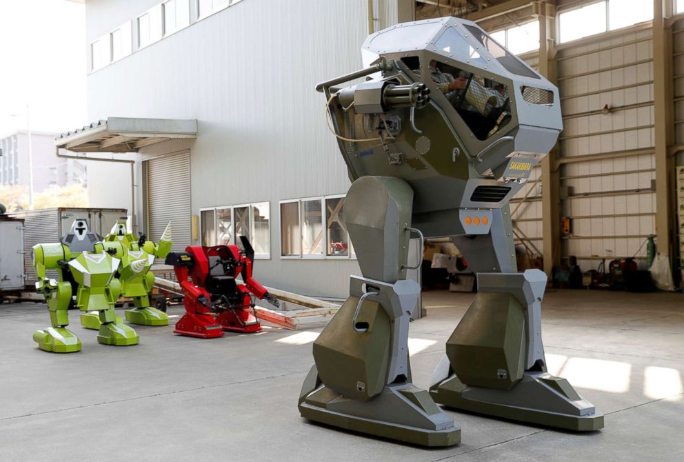 PHOTO: Sakakibara Kikai's engineer Masaaki Nagumo controls the bipedal robot Land Walker during its demonstration at its factory in Shinto Village, Gunma Prefecture, Japan, April 12, 2018.