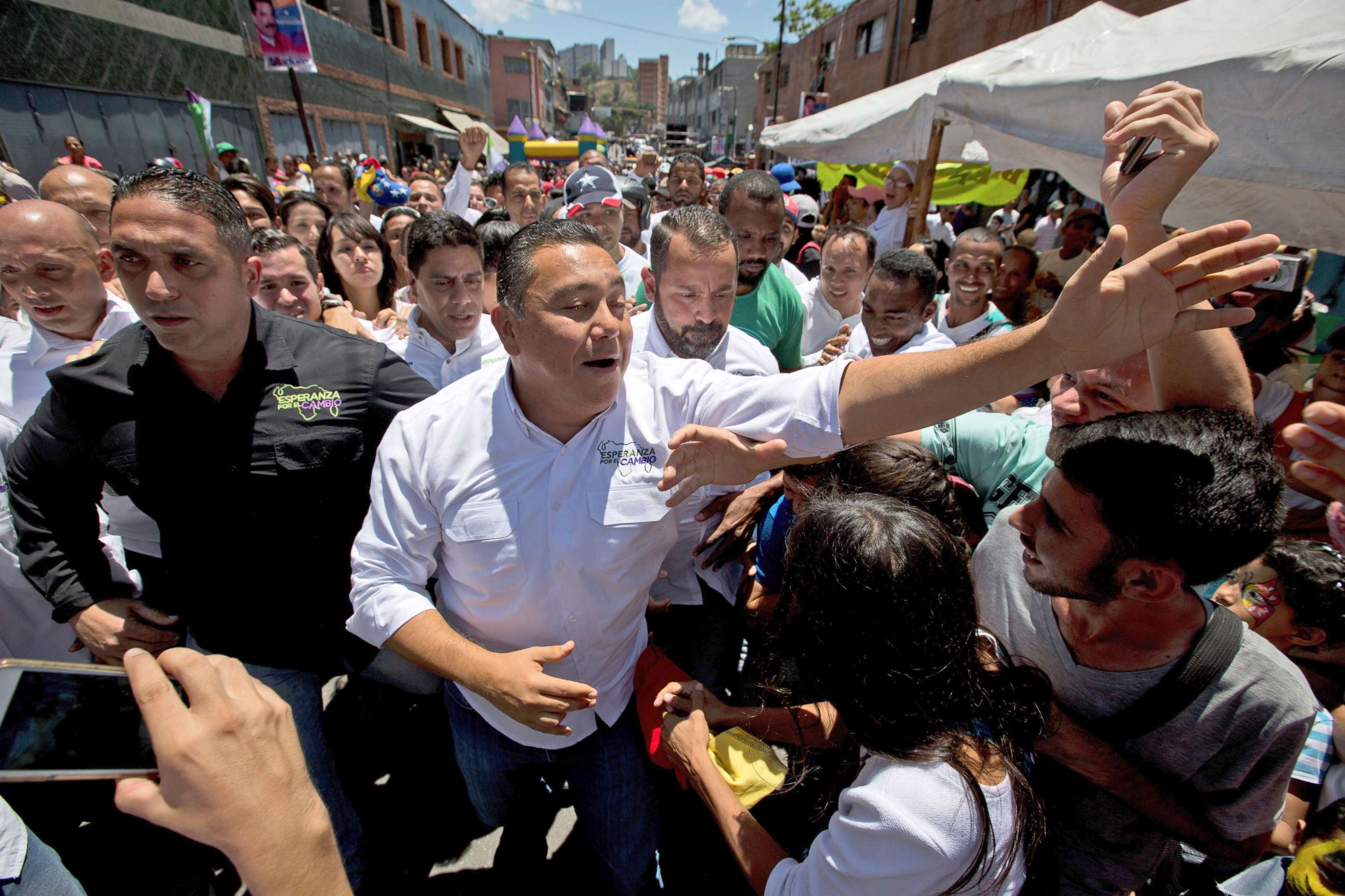 PHOTO: Venezuelan presidential candidate Javier Bertucci, center, greets supporters during a rally in Caracas, Venezuela, May 12, 2018.