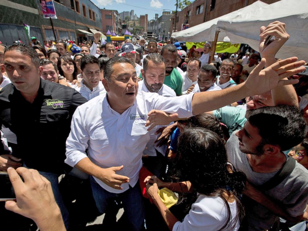 PHOTO: Venezuelan presidential candidate Javier Bertucci, center, greets supporters during a rally in Caracas, Venezuela, May 12, 2018.