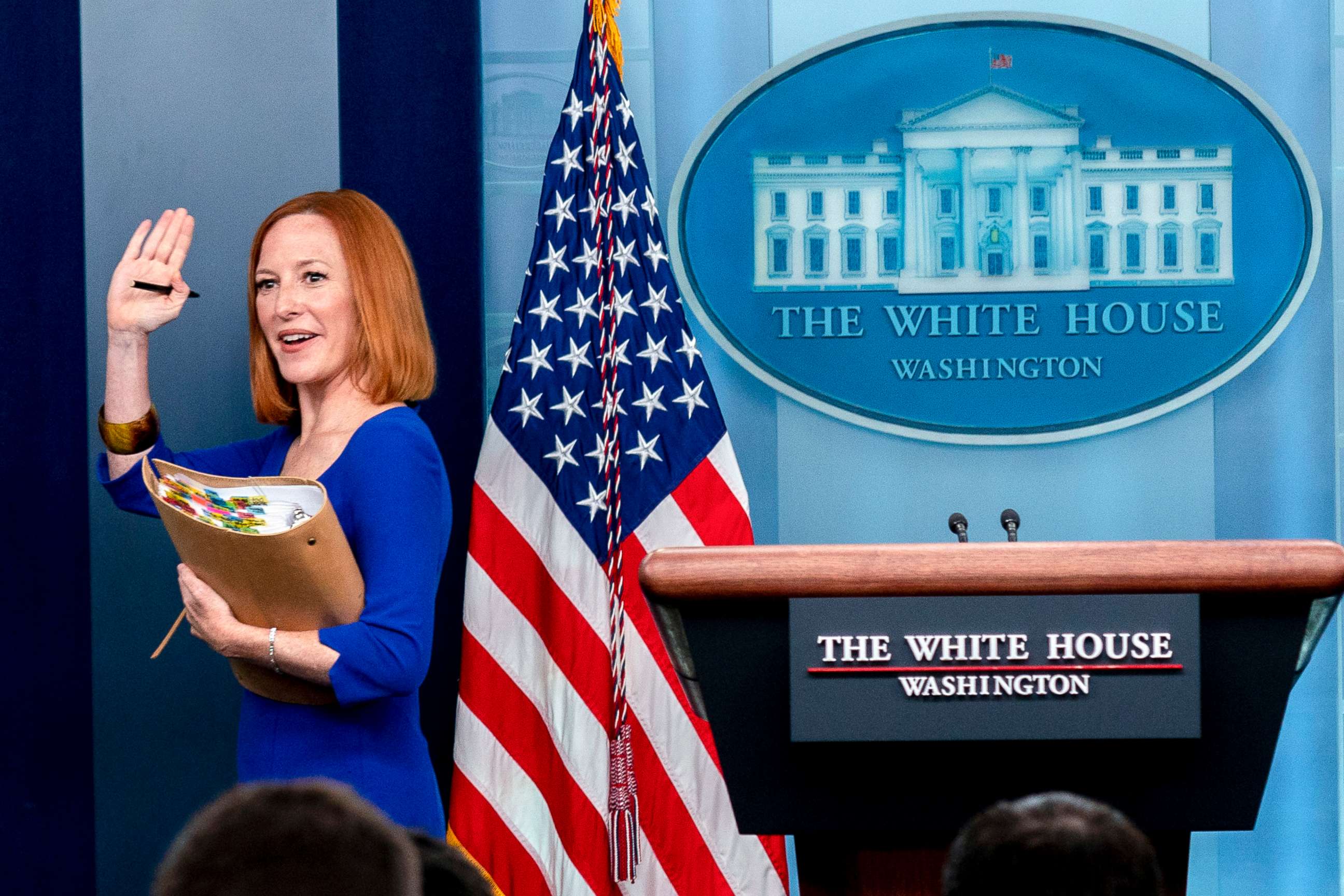 PHOTO: White House press secretary Jen Psaki waves goodbye at her last press briefing at the White House in Washington, D.C., May 13, 2022.