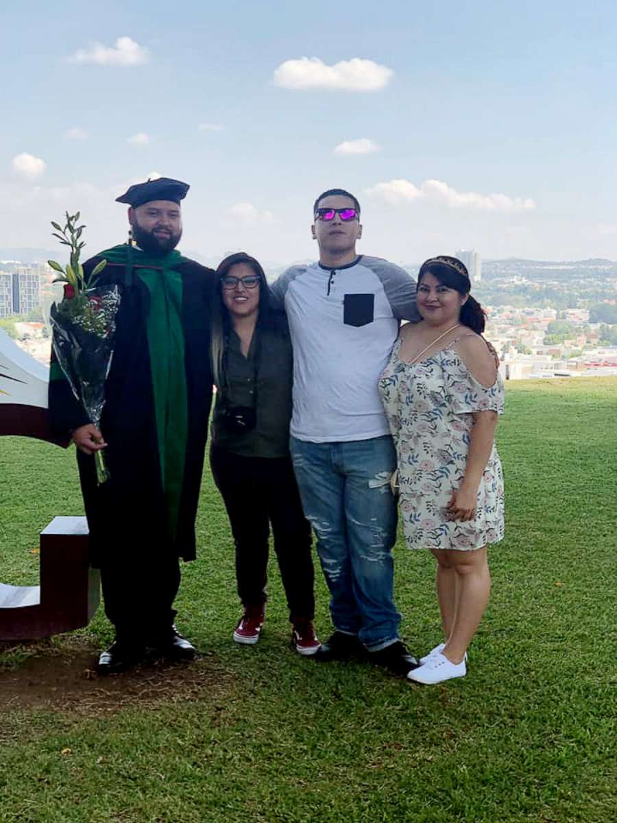 PHOTO: The family of Jessy Pacheco, 30, attends his graduation from medical school in Guadalajara, Mexico, June 14, 2019.