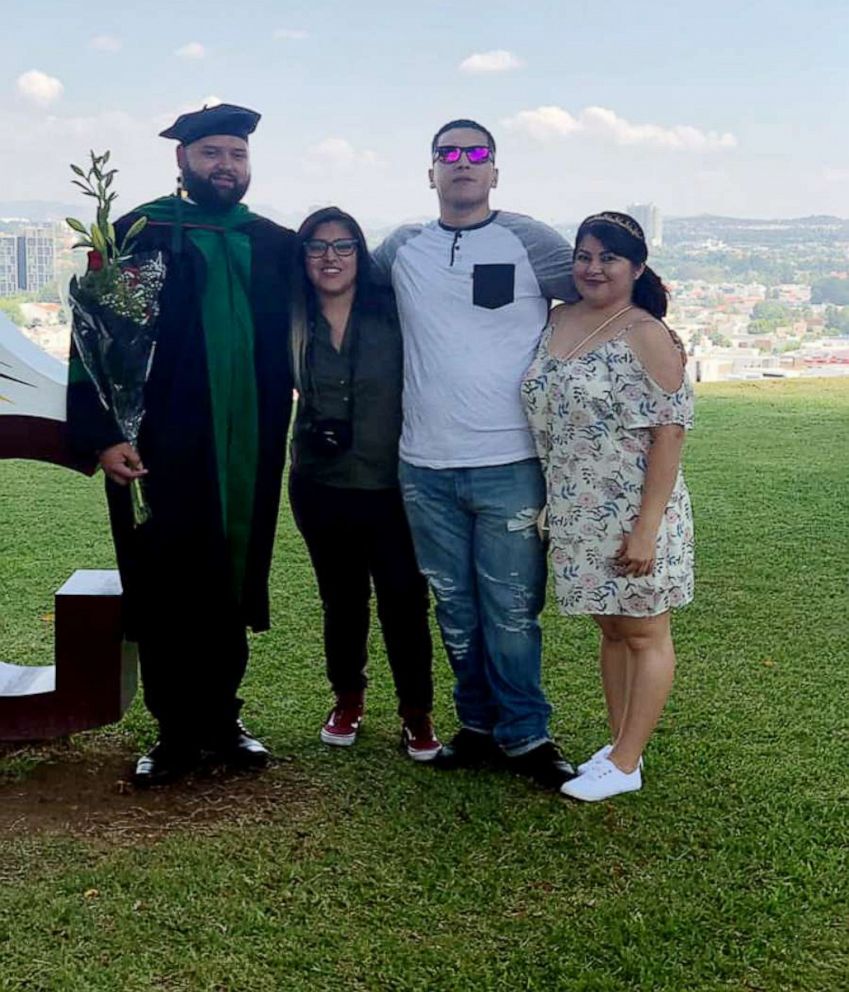 PHOTO: The family of Jessy Pacheco, 30, attends his graduation from medical school in Guadalajara, Mexico, June 14, 2019.