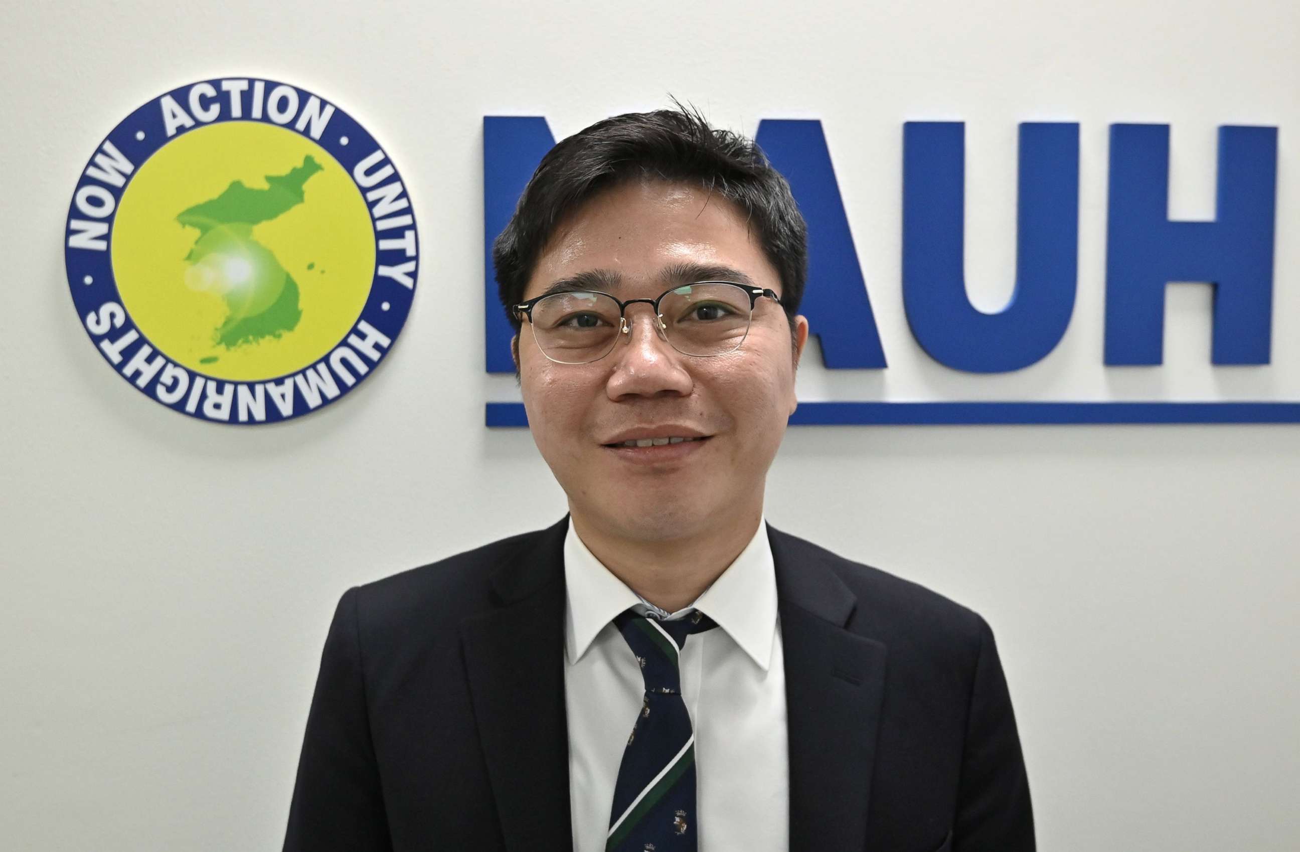 PHOTO: This picture taken on March 24, 2020 shows North Korean defector and human rights activist Ji Seong-ho, who is running for a proportional representation seat for South Korea's main opposition United Future Party, posing at his office in Seoul.