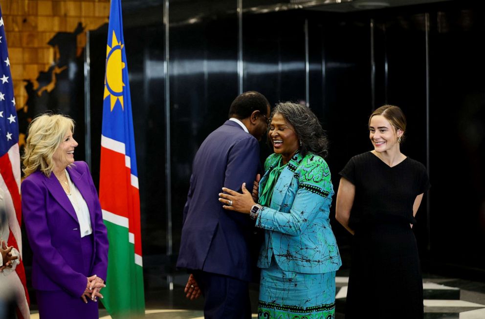 PHOTO: Namibian President Hage Geingob and his wife Monica Geingos embrace as U.S. First Lady Jill Biden looks on, during the first leg of her African visit, Feb. 22, 2023, at the State House in Windhoek, Namibia.