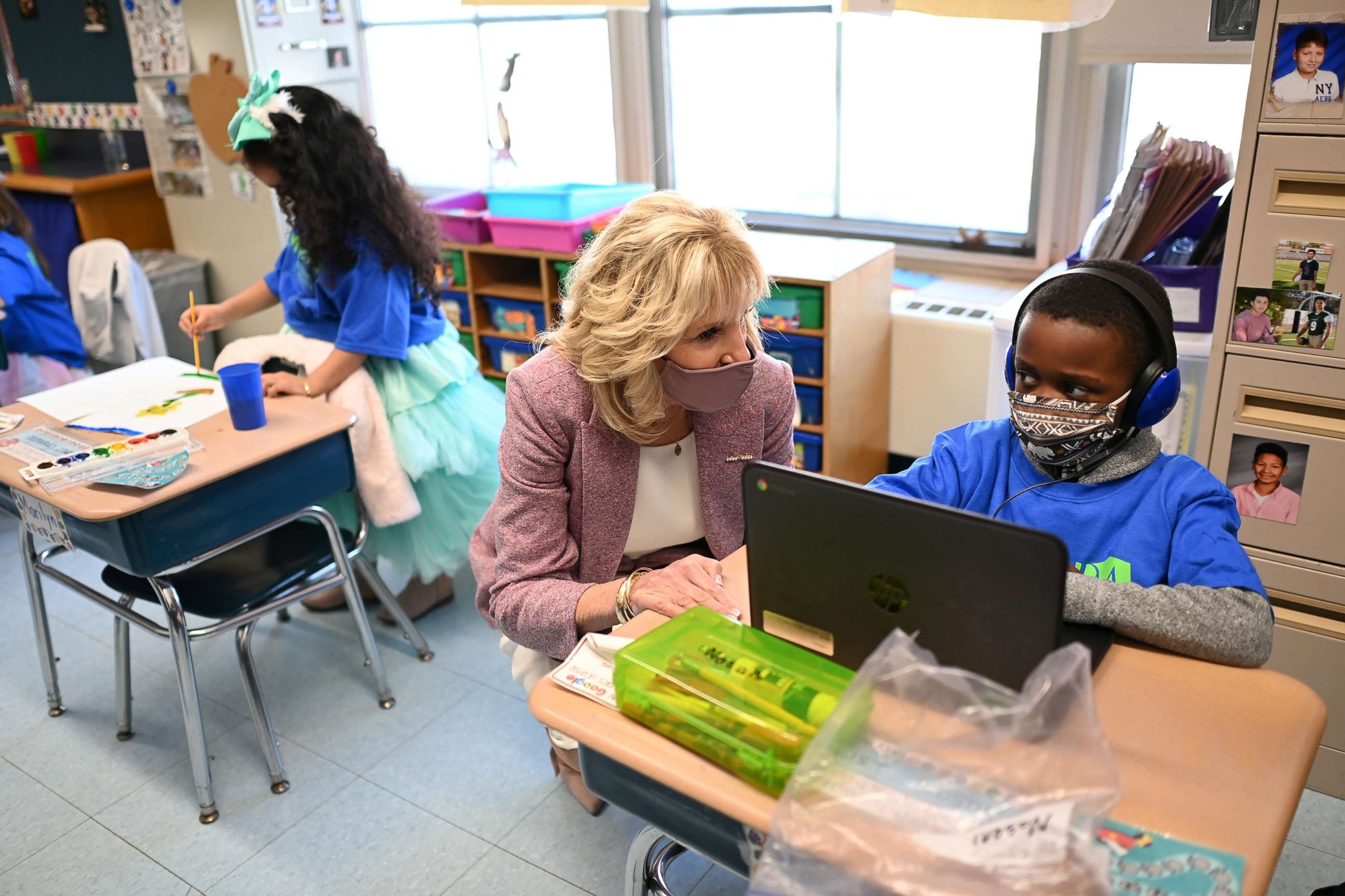 PHOTO: First lady Jill Biden speaks with a student as she tours Benjamin Franklin Elementary School in Meriden, Conn. on March 3, 2021.