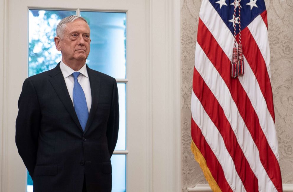 PHOTO: US Secretary of Defense Jim Mattis attends the swearing-in ceremony of Robert Wilkie as Secretary of Veterans Affairs in the Oval Office of the White House, July 30, 2018, in Washington, DC.