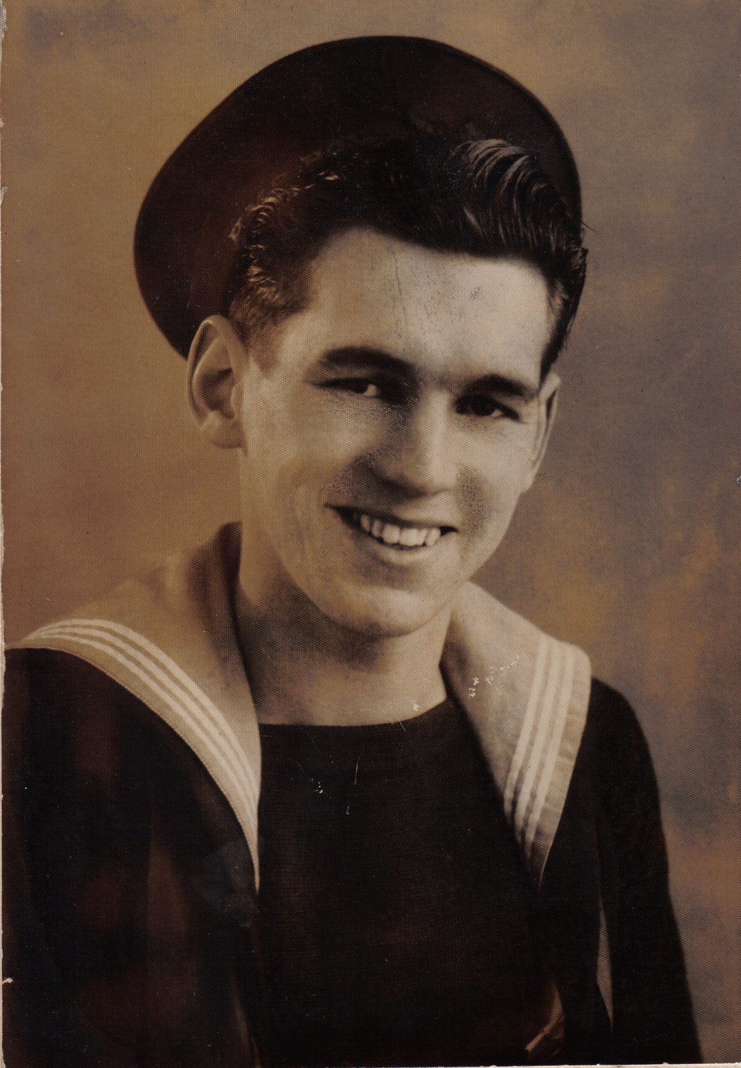 PHOTO: Jim Radford, here pictured as a sailor in the Royal Navy when he was 18, was just 15 years old when he served during the D-Day landings.