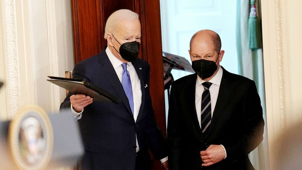PHOTO: German Chancellor Olaf Scholz and US President Joe Biden arrive for a press conference at the White House, Feb. 7, 2022.
