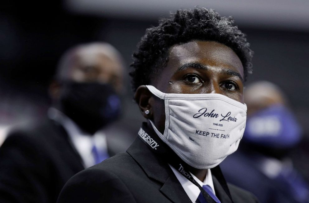 PHOTO: Titus Sizemore, wearing a face mask with the words "John Lewis, Keep the Faith" at the memorial service for the late U.S. Congressman John Lewis at Troy University's Trojan Arena in Troy, Ala., July 25, 2020.