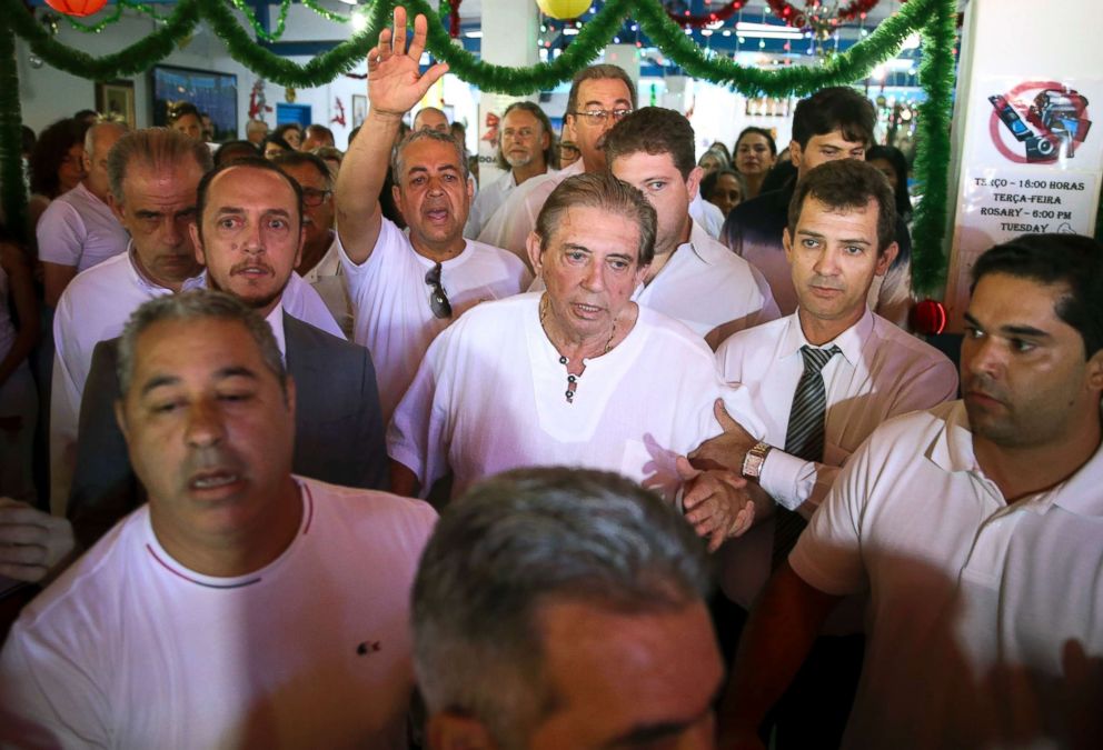  Spiritual healer Joao Teixeira de Faria, better known as John of God, arrives to the Dom Inacio Loyola House in Abadiania, Brazil, Dec. 12, 2018.
     