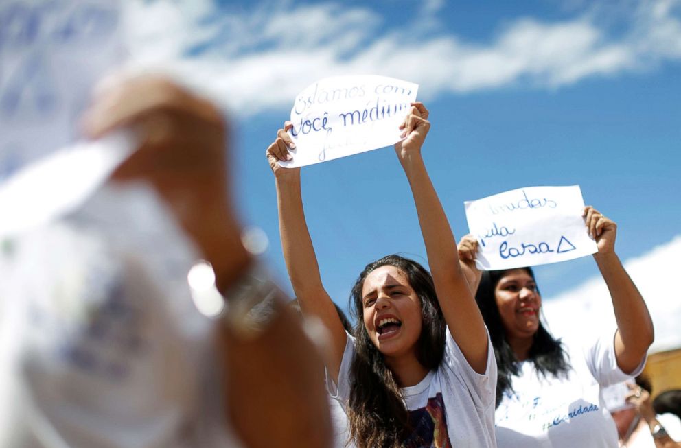 PHOTO: Followers of Brazilian spiritual healer Joao Teixeira de Faria, known as "John of God", take part in a demonstration in Abadiania, Brazil, Dec. 13, 2018.