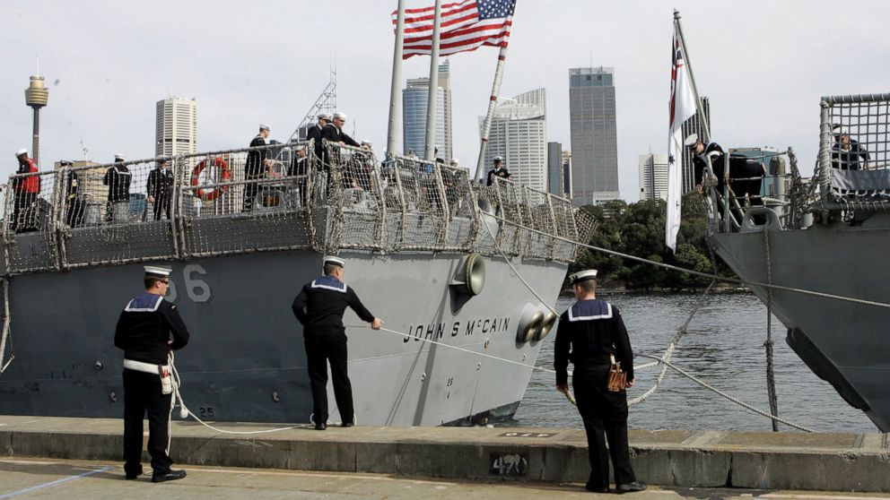 PHOTO: In this Aug. 20, 2008, file photo, Australian sailors tie up the USS John S McCain (DDG-56) as she arrives in Sydney, Australia for the 100th Anniversary of the Great White Fleet.