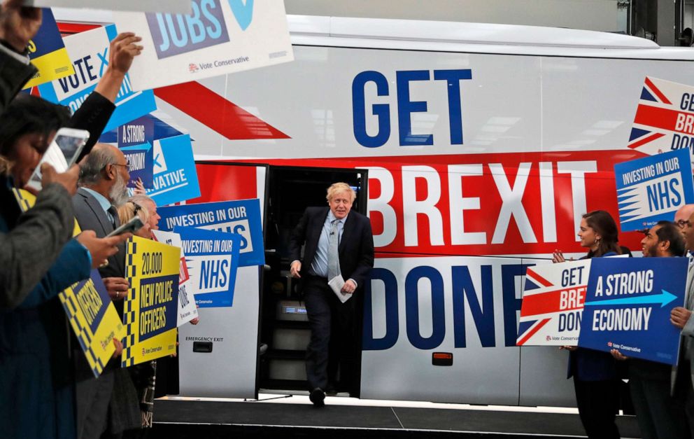 PHOTO: Britain's Prime Minister Boris Johnson addresses his supporters prior to boarding his General Election campaign trail bus in Manchester, England, Nov. 15, 2019.