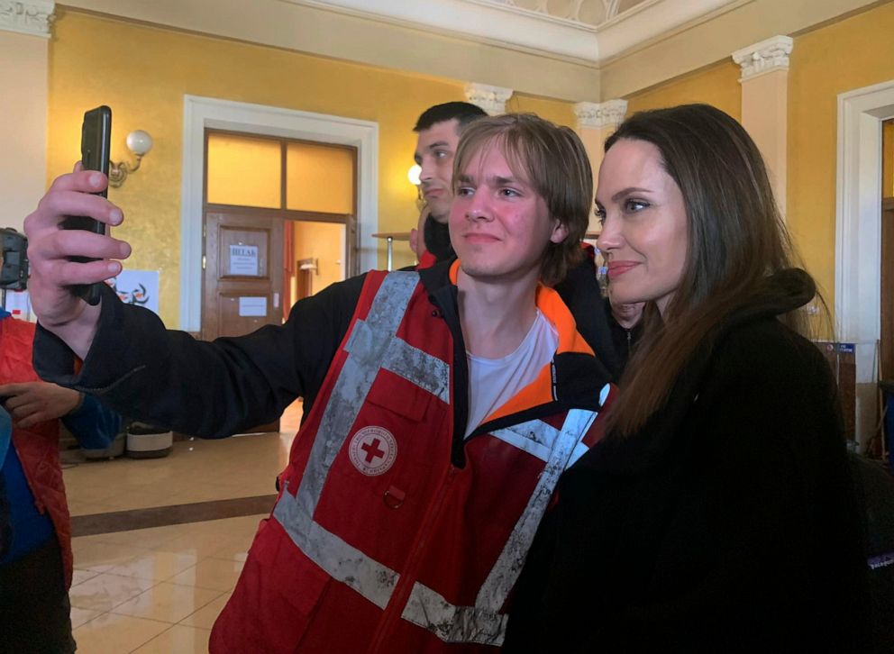 PHOTO: Angelina Jolie, Hollywood movie star and UNHCR goodwill ambassador, poses for photo with her fans in Lviv, Ukraine, Saturday, April 30, 2022.