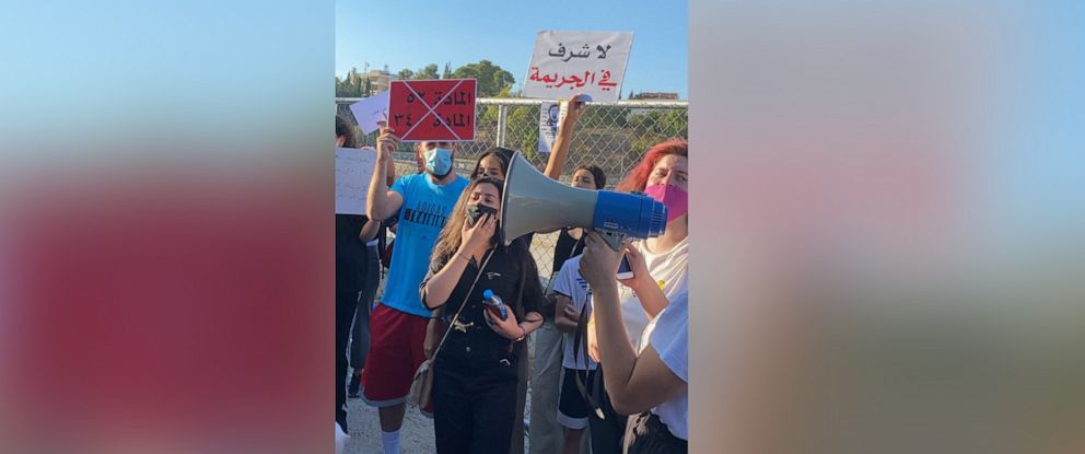 PHOTO: Protesters gather in front of the Jordanian Parliament building chanting demands for changes in Jordan's laws punishing those involved in honor killings. 