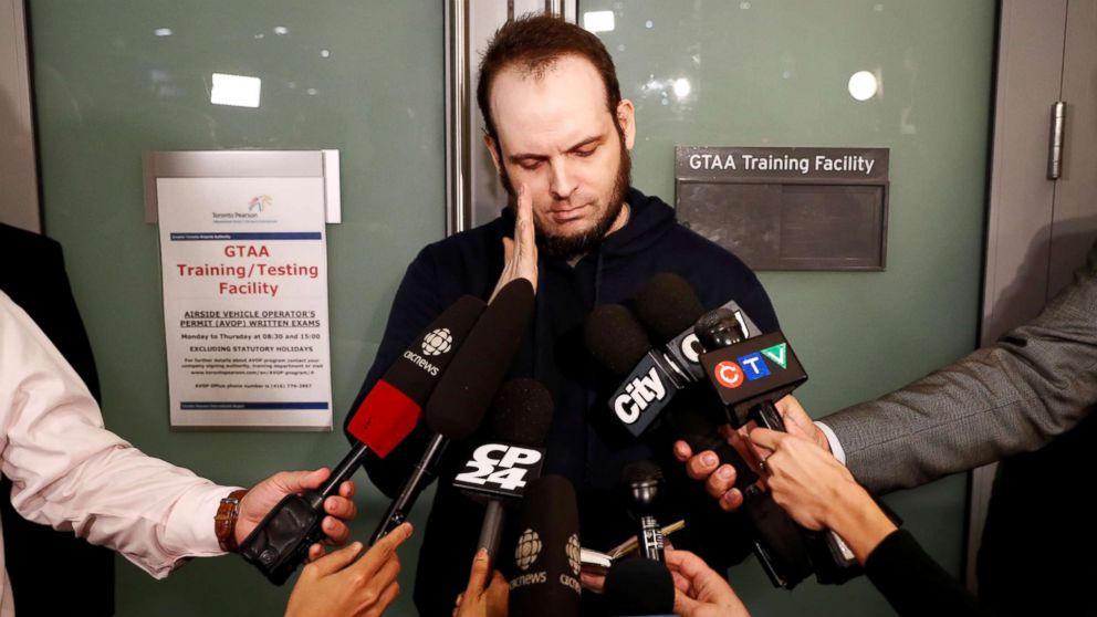 Joshua Boyle speaks to the media after arriving with his wife and three children to Toronto Pearson International Airport, nearly 5 years after he and his wife were abducted in Afghanistan in 2012 by the Taliban-allied Haqqani network, in Toronto, Oct. 13, 2017.   