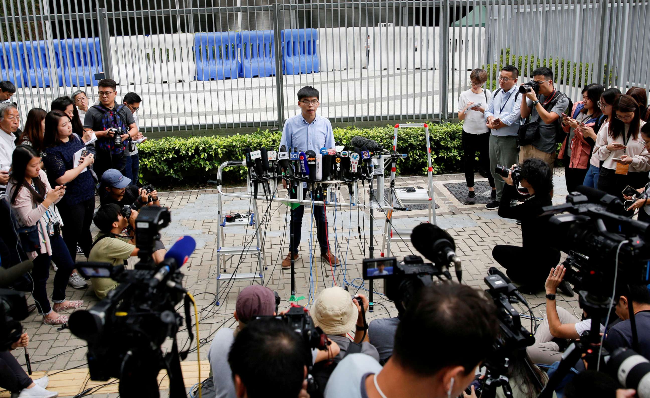 PHOTO: Pro-democracy activist Joshua Wong speaks to journalists after being disqualified from running in November's local district's council elections, in Hong Kong, Oct. 29, 2019.