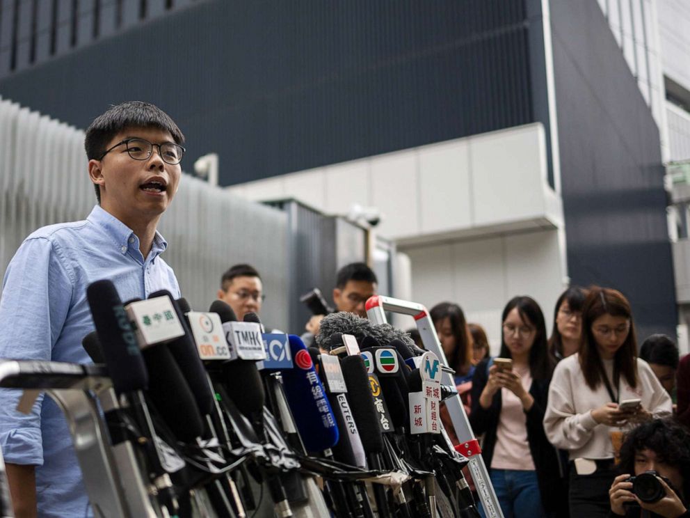 PHOTO: Pro-democracy activist and leader of Hong Kongs Demosisto party, Joshua Wong, left, speaks at a press conference outside the Legislative Council in Hong Kong, Oct. 29, 2019, after he was barred from running in the District Council Elections.