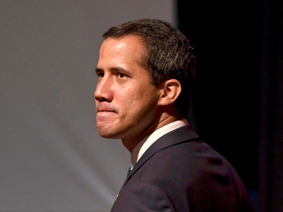 PHOTO: Venezuelan opposition leader and self-proclaimed acting president Juan Guaido arrives for a meeting with a group of workers of the state oil company of Venezuela (PDVSA) at the Metropolitan University in Caracas, May 3, 2019.