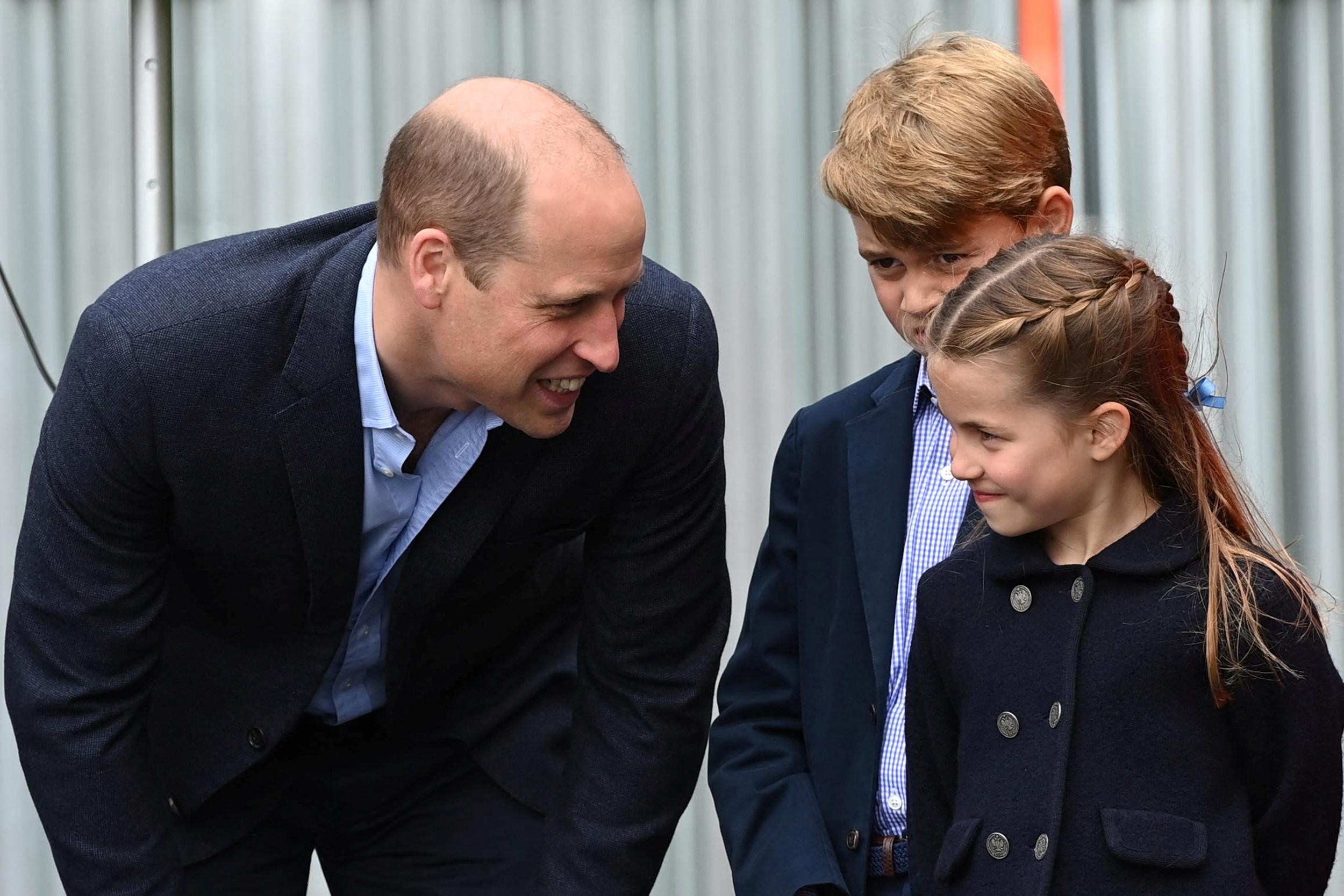 PHOTO: Prince William speaks to his children Prince George and Princess Charlotte during their visit to Cardiff Castle as part of the royal family's tour for Queen Elizabeth's Platinum Jubilee celebrations in Cardiff, Wales, June 4, 2022. 