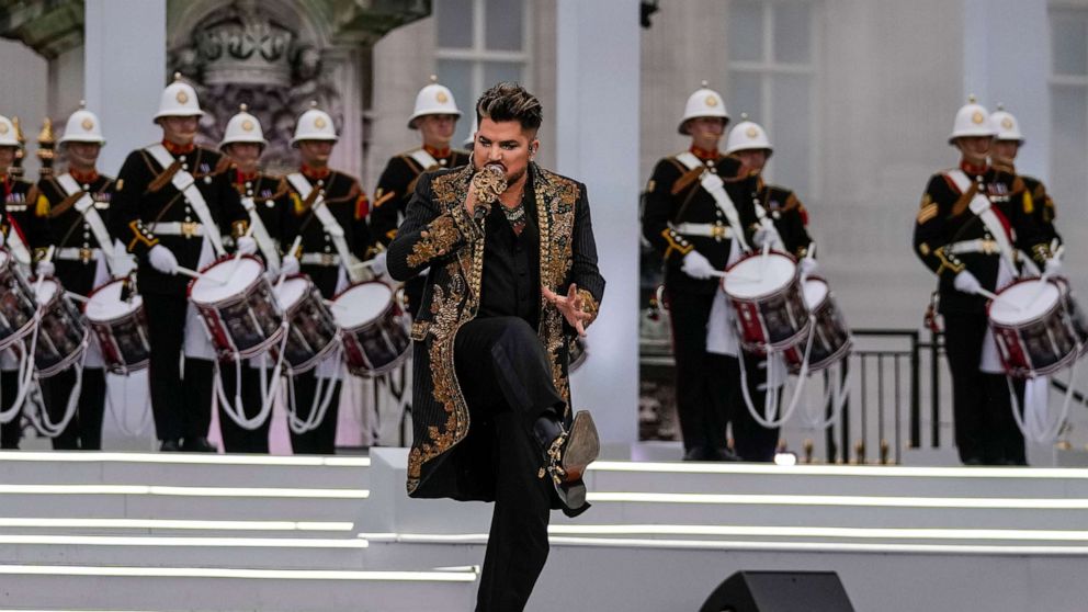 PHOTO: Adam Lambert, center, from the band Queen performs with the Royal Marine drummers at the Platinum Jubilee concert taking place in front of Buckingham Palace, London, June 4, 2022.