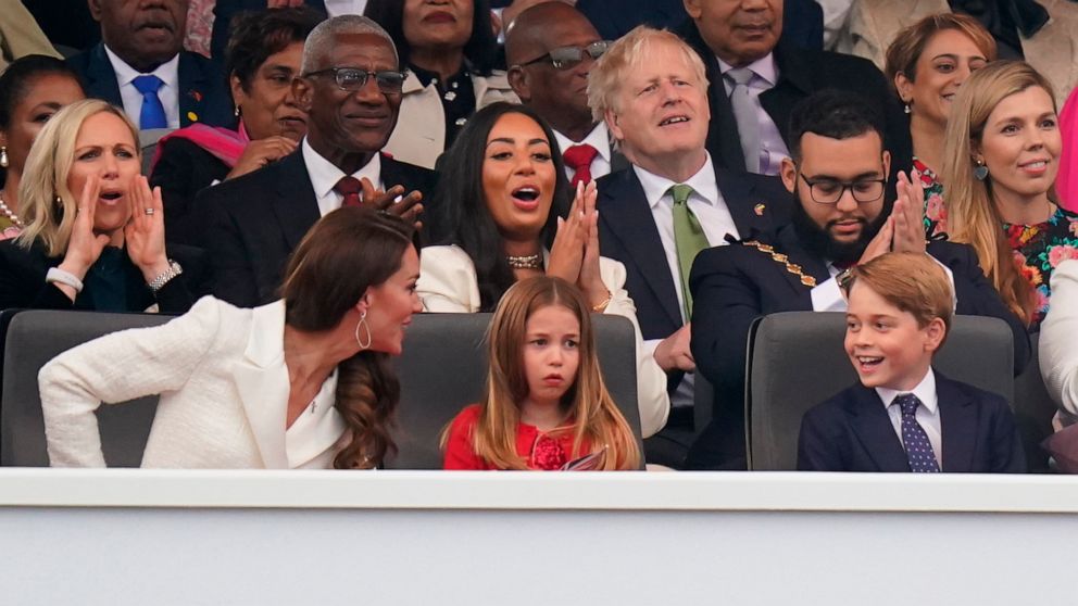 PHOTO: Front row from left, Britain's Kate, Duchess of Cambridge, Princess Charlotte and Prince George at the Platinum Jubilee concert taking place in front of Buckingham Palace, London, June 4, 2022.