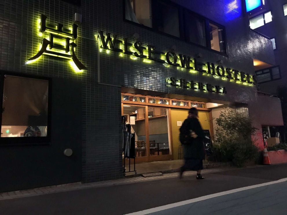 PHOTO: A pedestrian walks past the exterior of Wise Owls Hostels Shibuya in Tokyo, Feb. 1, 2019.