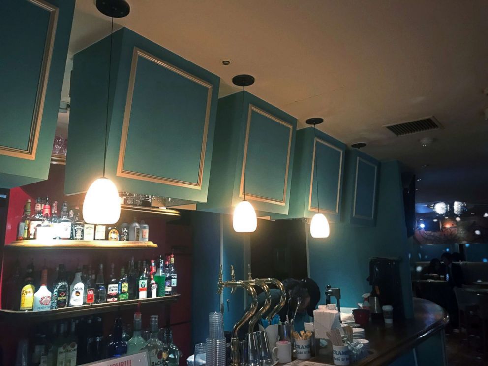 PHOTO: Pendant lamps hang over the counter at Scramble Cafe & Bar in Tokyo, Jan. 31, 2019.