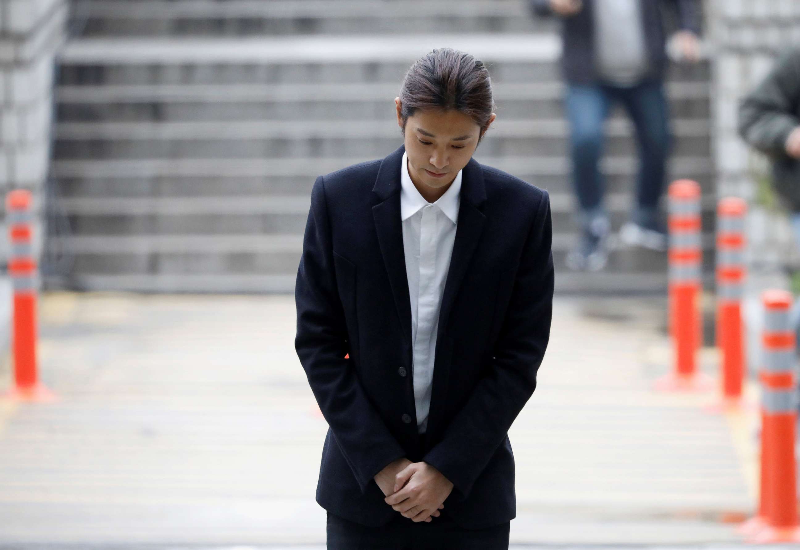 PHOTO: South Korean singer Jung Joon-young arrives at a court to attend a hearing for reviewing the prosecution's detention warrant at the Seoul Central District Court in Seoul, South Korea, March 21, 2019.