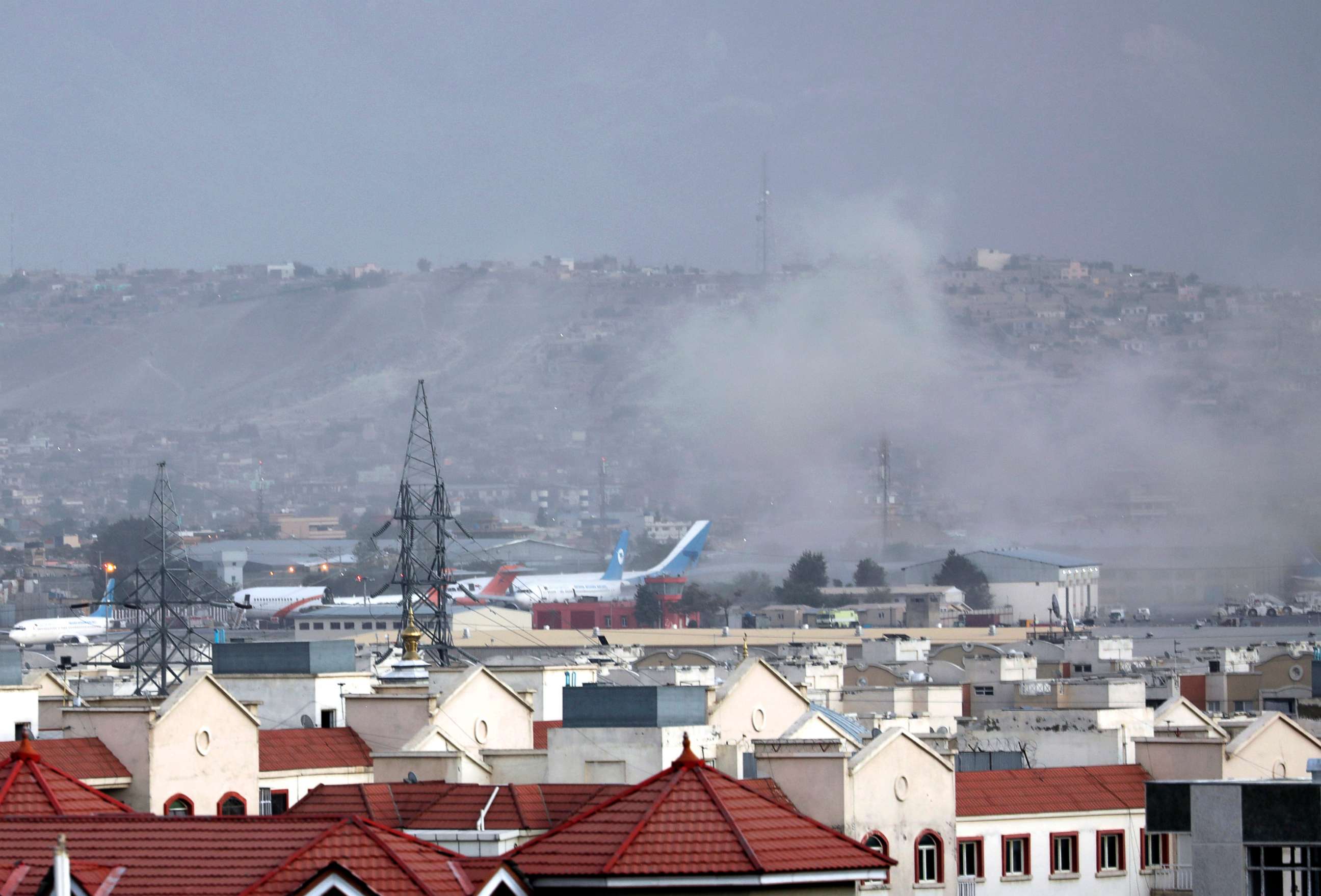 PHOTO: Smoke rises from explosion outside the airport in Kabul, Aug. 26, 2021. The explosion went off outside Kabul Airport, where thousands of people have flocked as they try to flee the Taliban takeover of Afghanistan. 