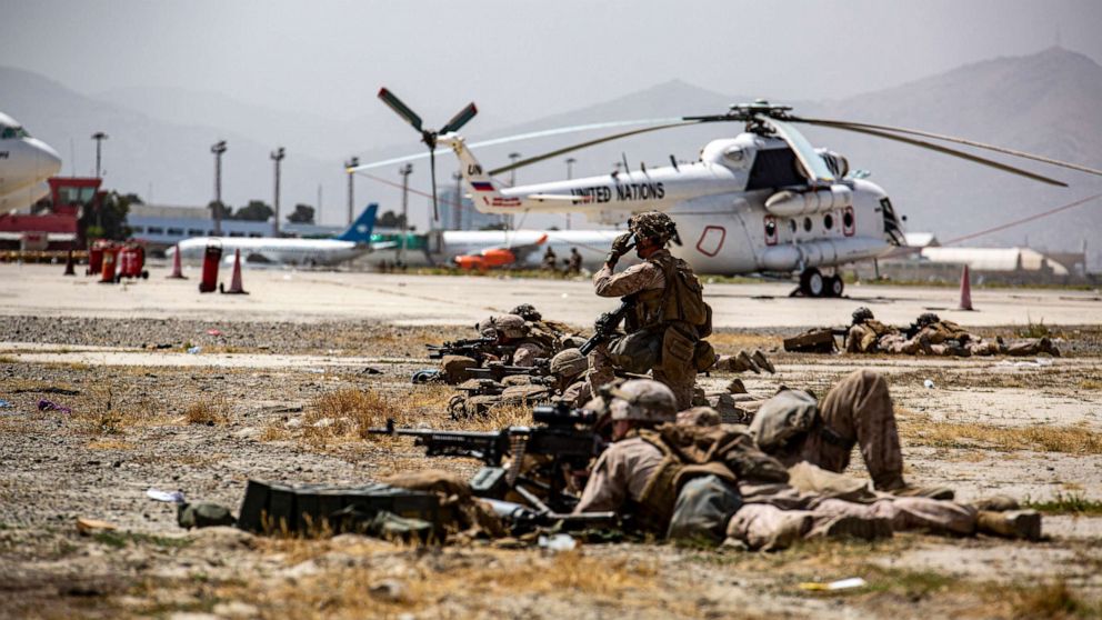 PHOTO: In this image provided by the U.S. Marine Corps, Marines assigned to the Special Purpose Marine Air Ground Task Force-Crisis Response-Central Command provide security at Hamid Karzai International Airport in Kabul, Afghanistan, on Aug. 18, 2021.