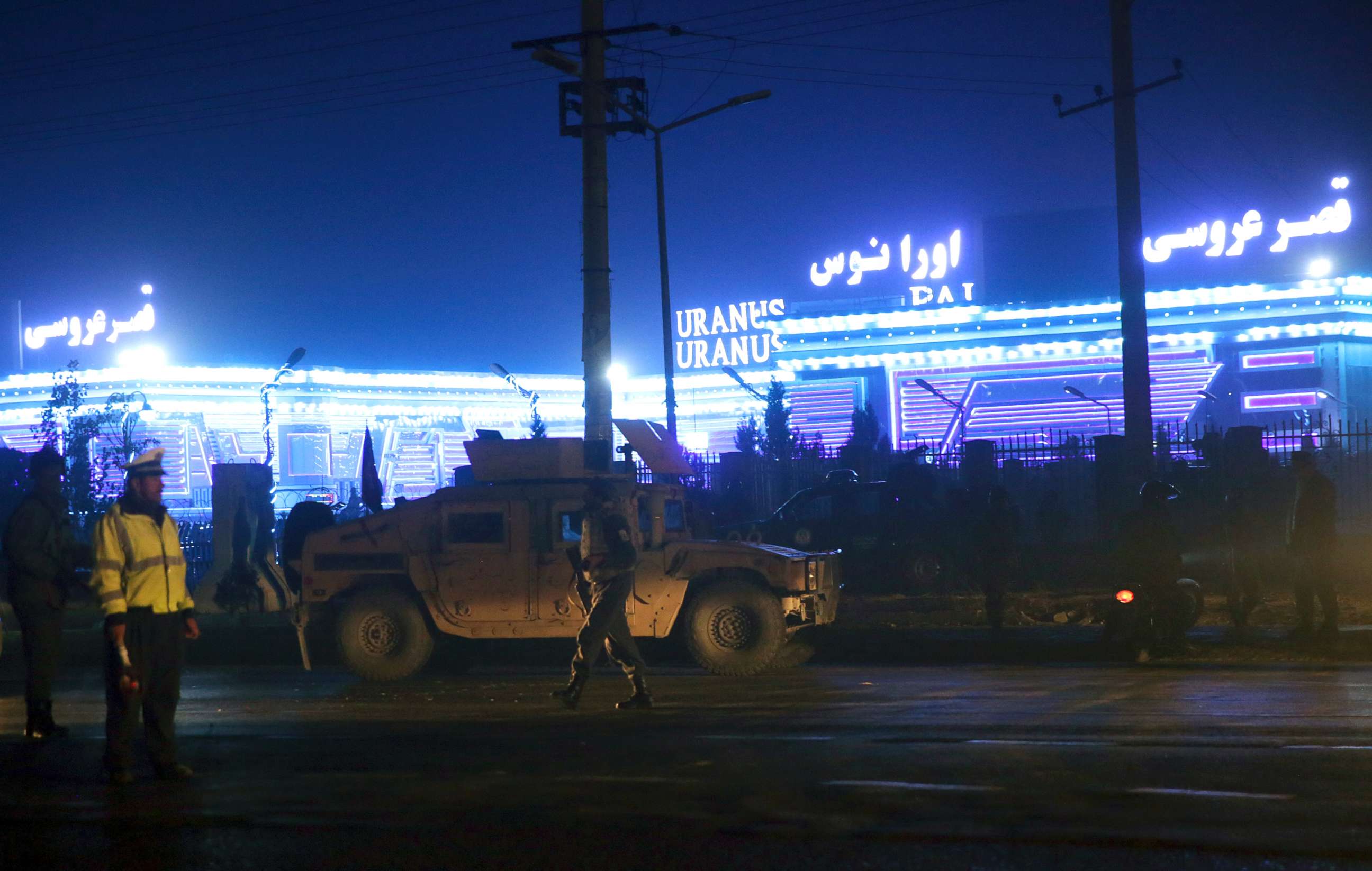 PHOTO: Security forces inspect the site of a suicide attack, happened inside a wedding hall in Kabul, Afghanistan, Nov. 20, 2018.