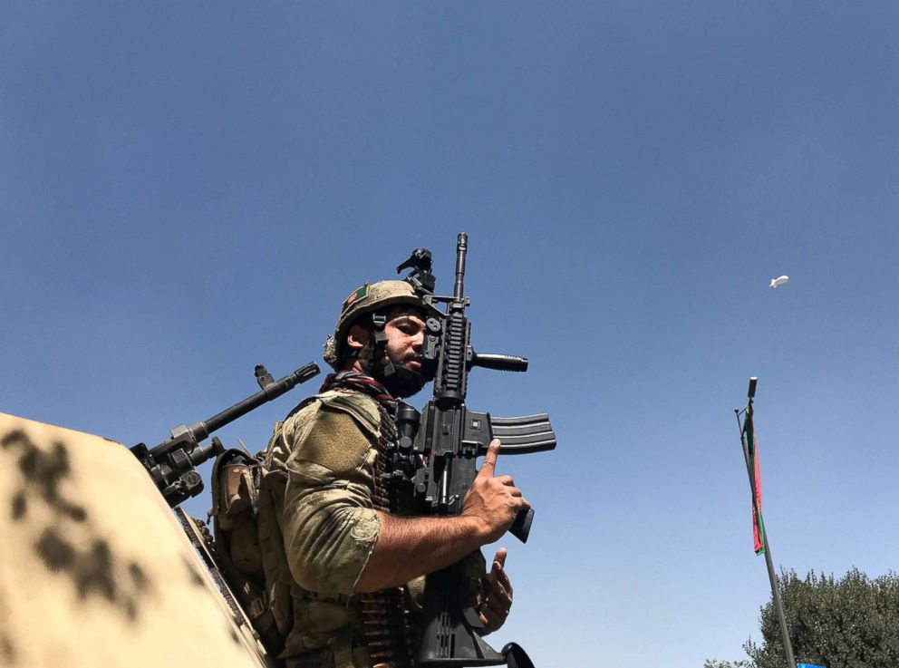 PHOTO: A member of the Afghan security forces keeps watch at the site of an attack in Kabul, Afghanistan, Aug. 21, 2018.