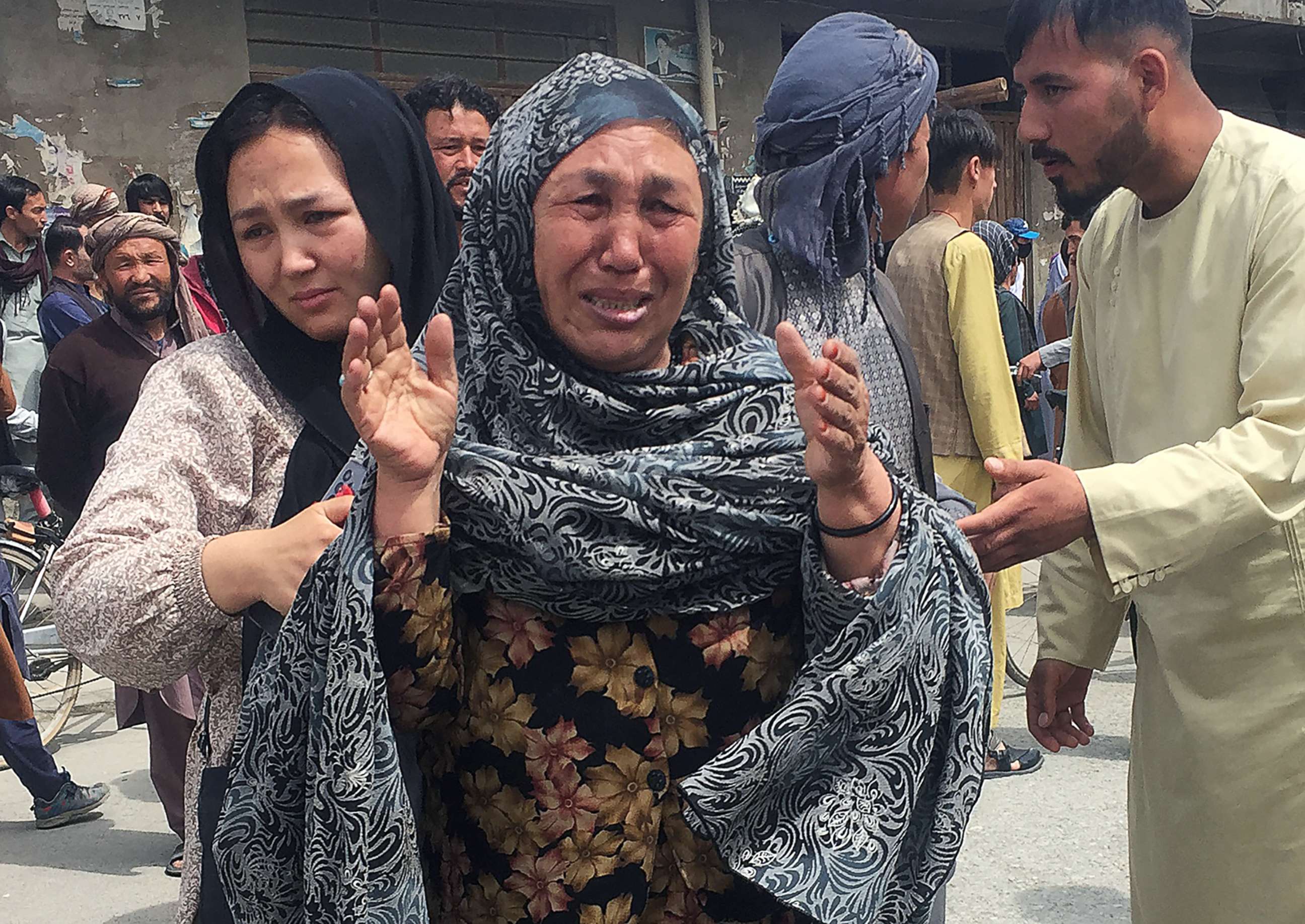 PHOTO: An Afghan woman cries after an explosion in front of a high school in Kabul, Afghanistan, April 19, 2022.