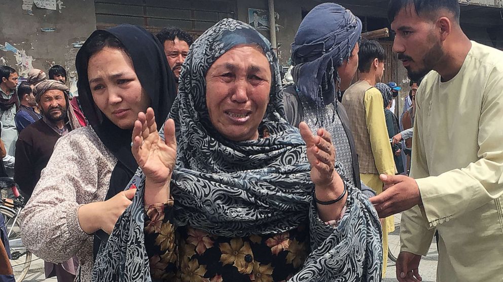 PHOTO: An Afghan woman cries after an explosion in front of a high school in Kabul, Afghanistan, April 19, 2022.