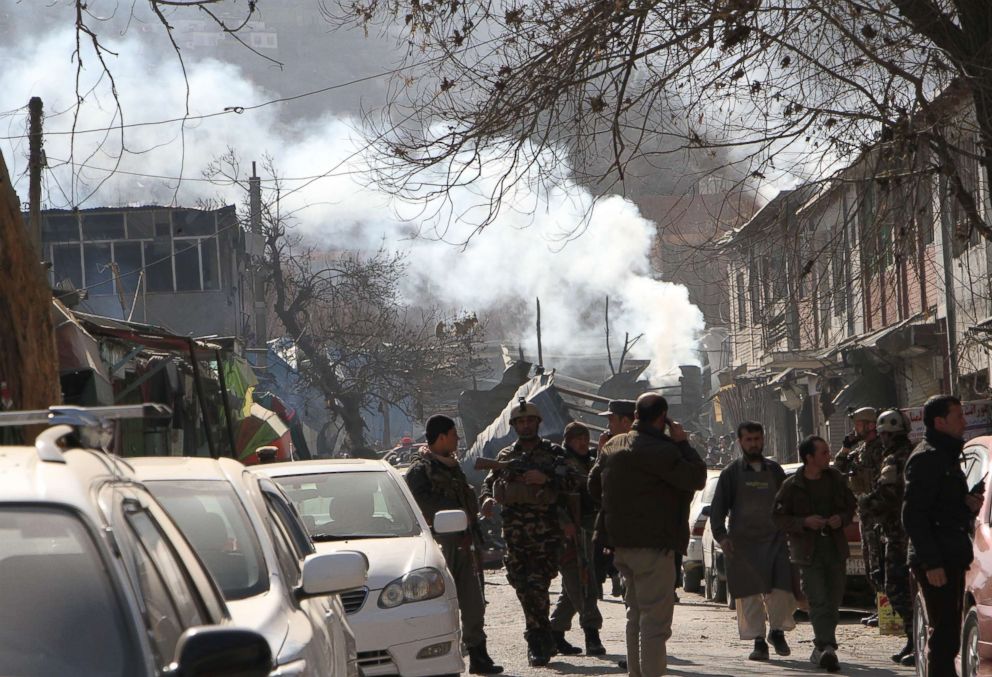 PHOTO: Afghan security officials inspect the scene of a suicide bombing in Kabul, Afghanistan on Jan. 27, 2018.