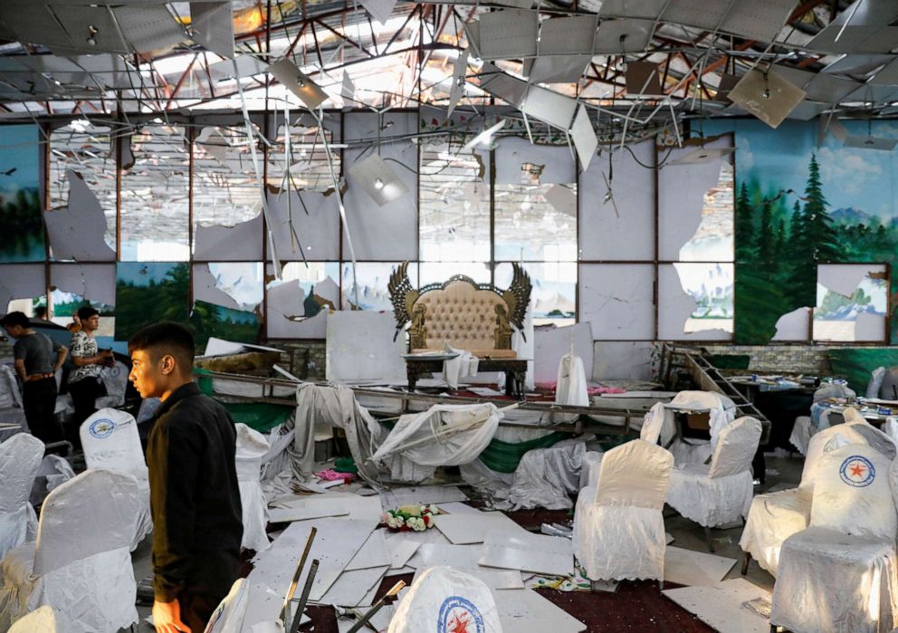 PHOTO: Workers of a wedding hall inspect after a blast in Kabul, Afghanistan, on Saturday, Aug. 18, 2019.