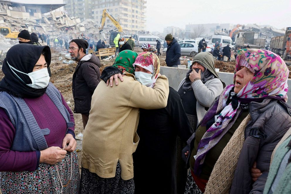 PHOTO: People console each other as the search for survivors continues after a deadly earthquake in Kahramanmaras, Turkey, Feb. 10, 2023.